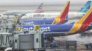 Blizzard fallout: JetBlue, American, Delta and United among carriers with mass cancellations