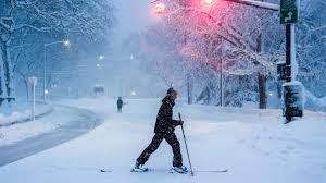 Blizzard shutters roads, grounds flights from Maryland to Maine and plunges hundreds of thousands into outages